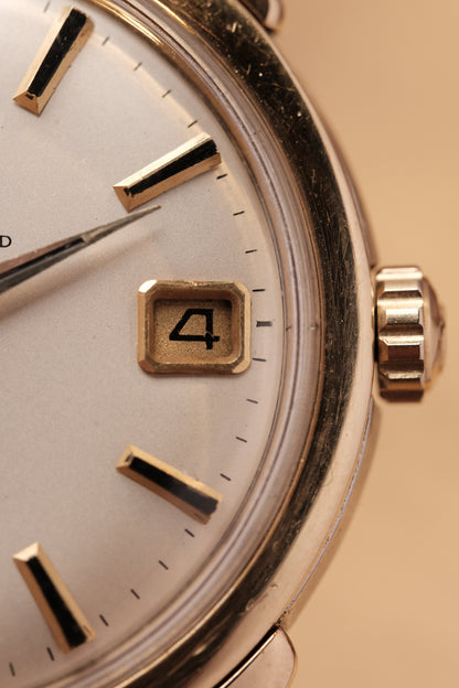 OMEGA CONSTELLATION DOG LEG GOLD AUTOMATIC CHRONOMETER REF. 168.005