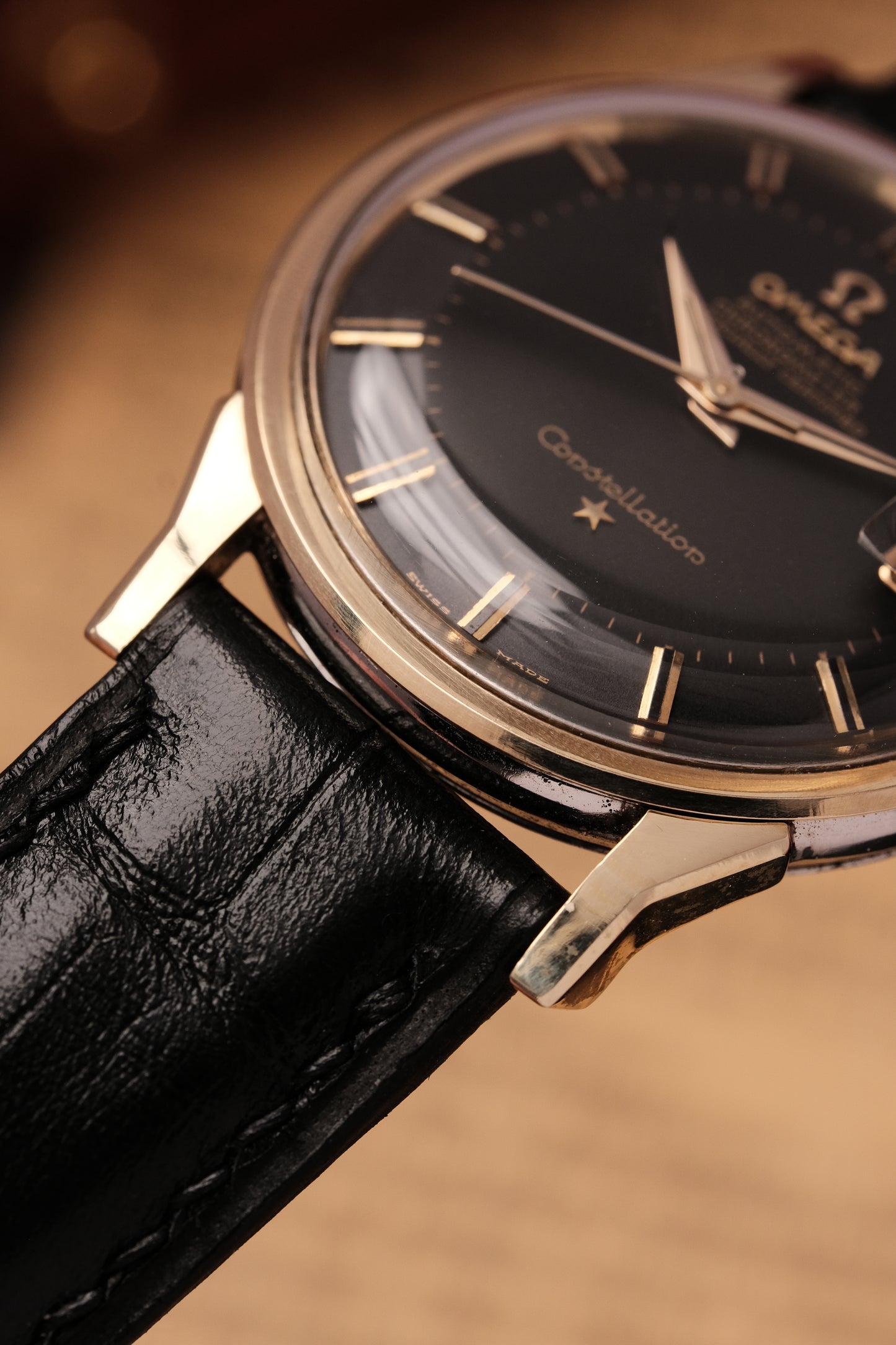 1961 OMEGA CONSTELLATION PIE PAN DOG LEG BLACK DIAL YELLOW GOLD AUTOMATIC CHRONOMETER REF. 168.005