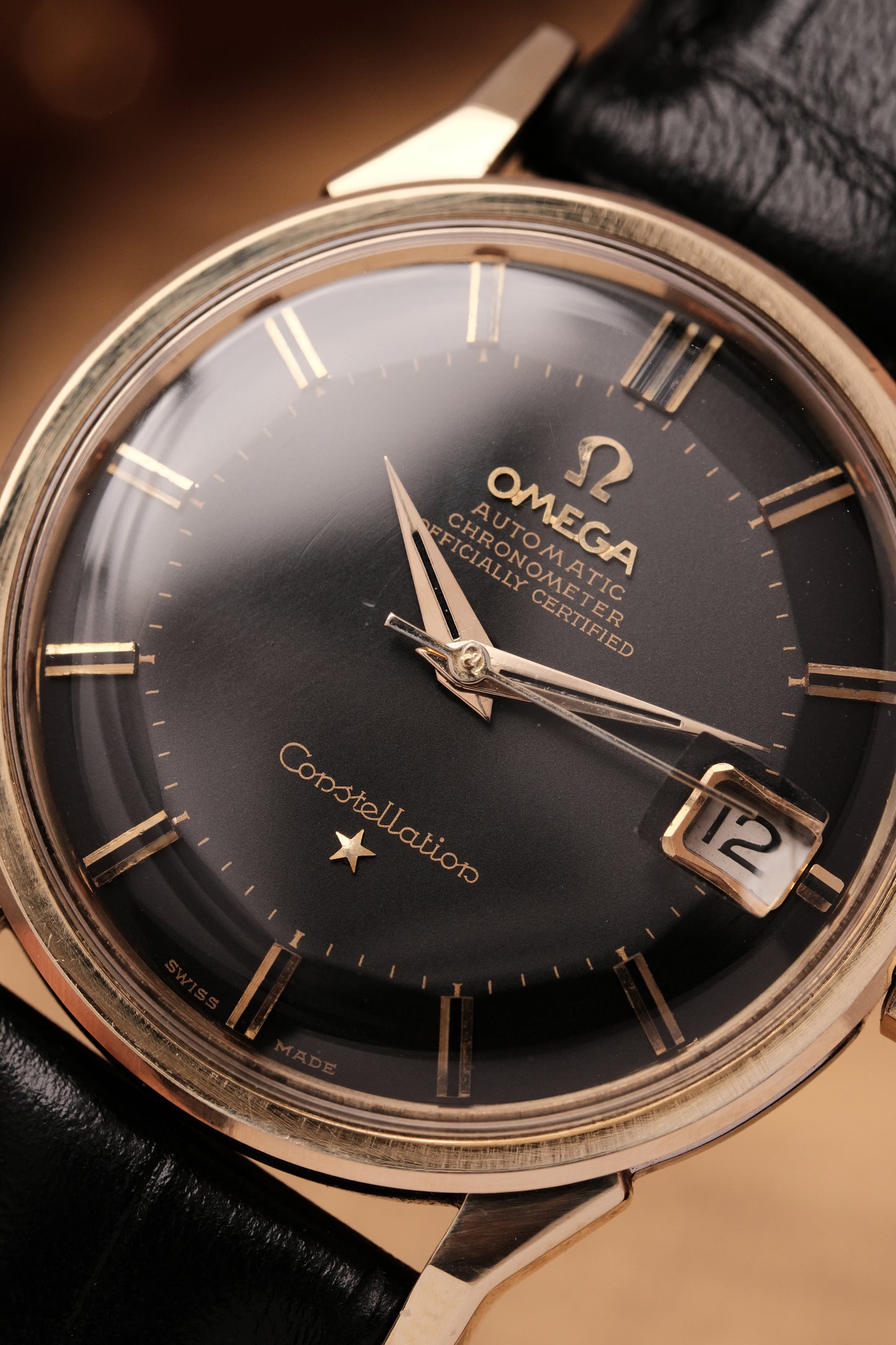 1961 OMEGA CONSTELLATION PIE PAN DOG LEG BLACK DIAL YELLOW GOLD AUTOMATIC CHRONOMETER REF. 168.005