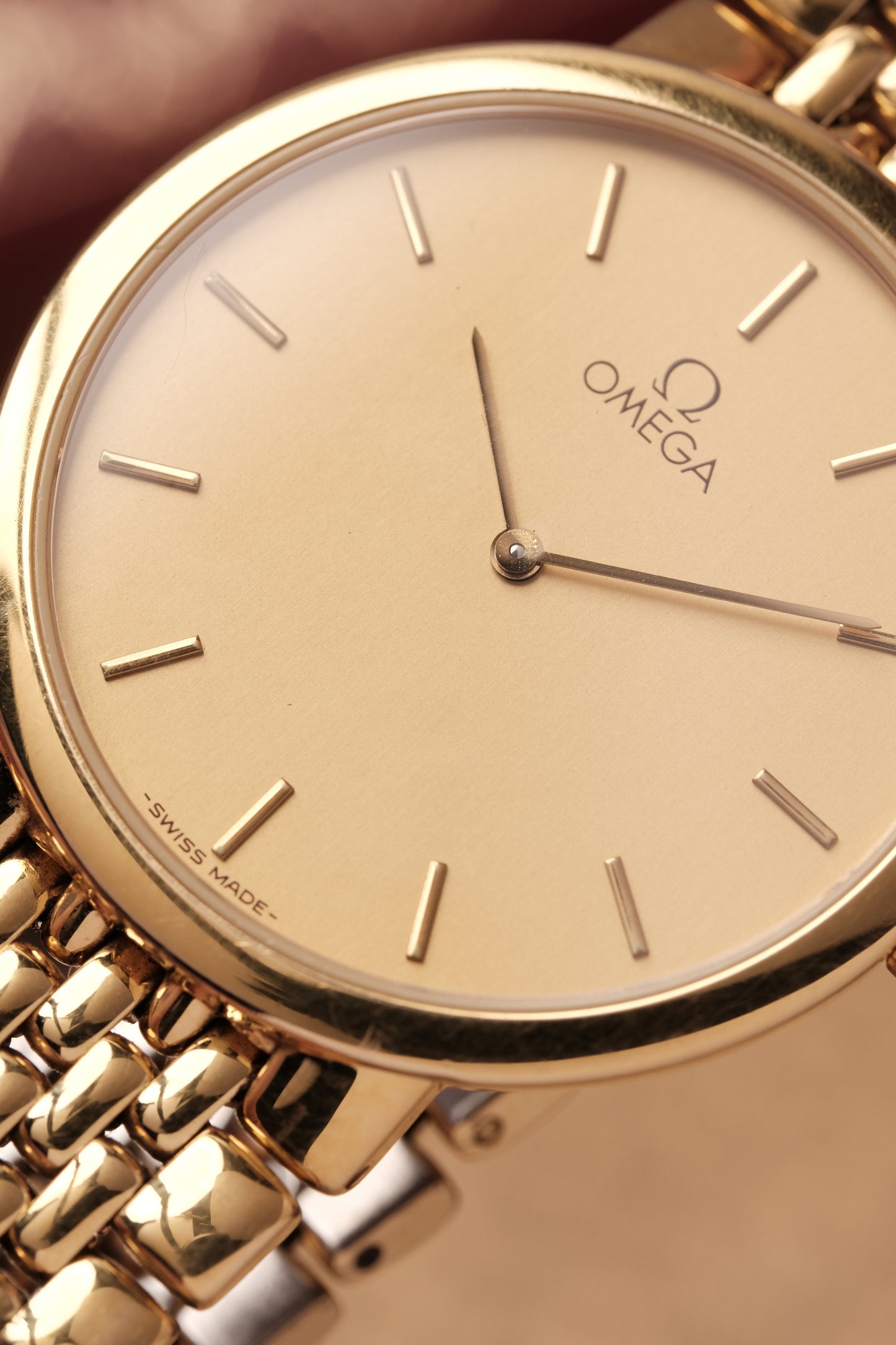 1990's (New Old Stock) Omega De Ville 395 0875.2 Quartz Gold Plated Integrated Bracelet