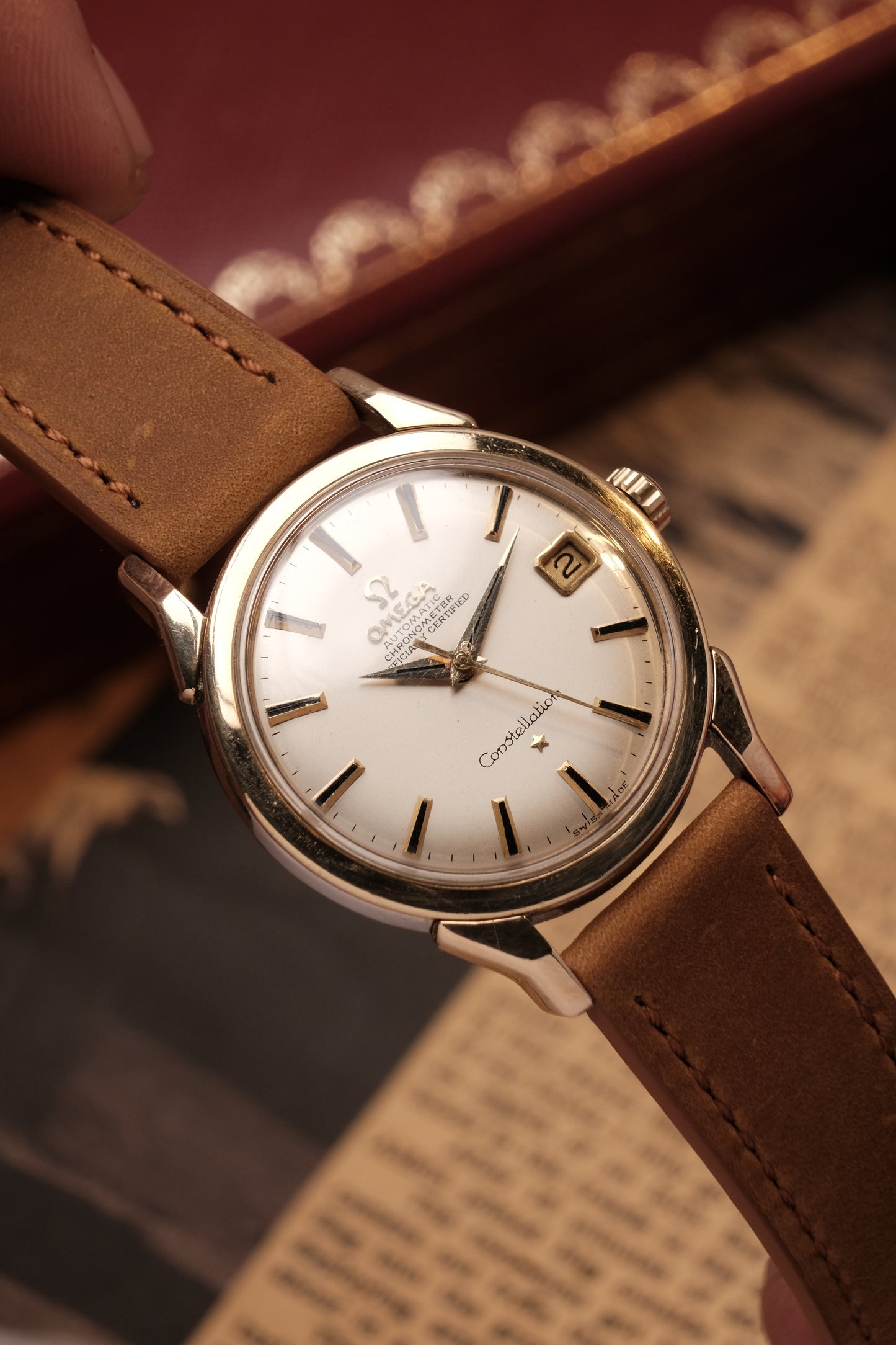 OMEGA CONSTELLATION DOG LEG GOLD AUTOMATIC CHRONOMETER REF. 168.005
