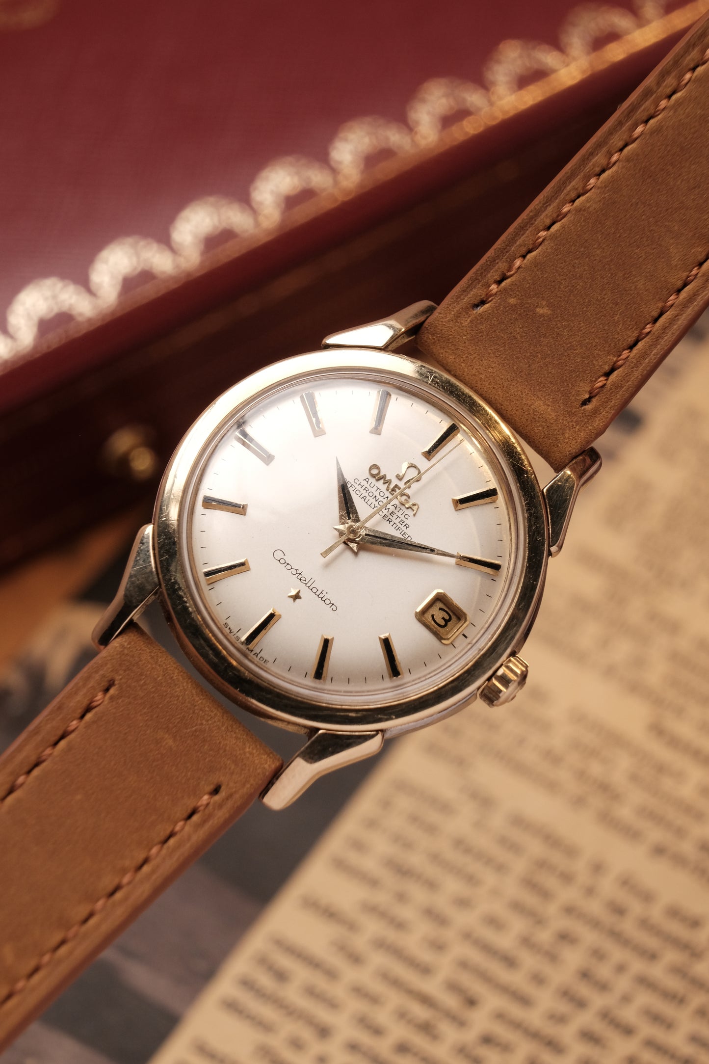 OMEGA CONSTELLATION DOG LEG GOLD AUTOMATIC CHRONOMETER REF. 168.005