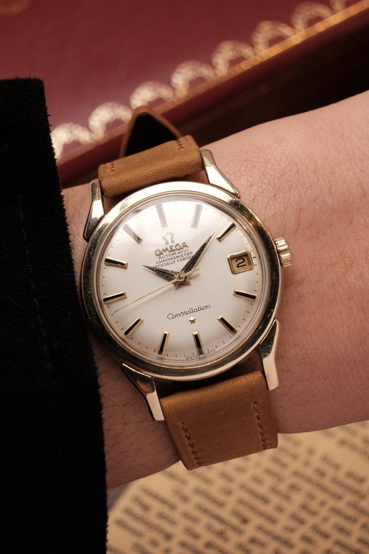 OMEGA CONSTELLATION DOG LEG GOLD AUTOMATIC CHRONOMETER REF. 168.005