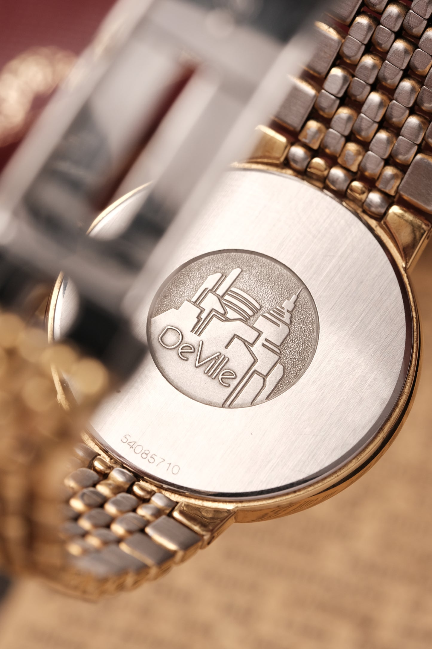 1990's (New Old Stock) Omega De Ville 395 0875.2 Quartz Gold Plated Integrated Bracelet