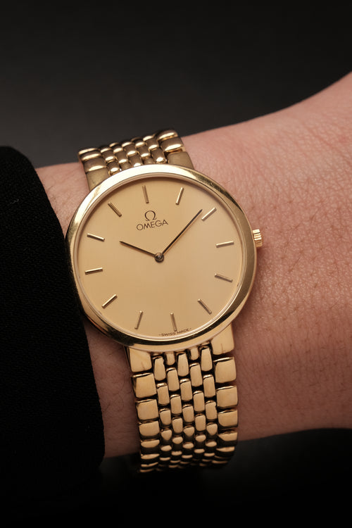 1990's (New Old Stock) Omega De Ville 395 0875.2 Quartz Gold Plated Integrated Bracelet
