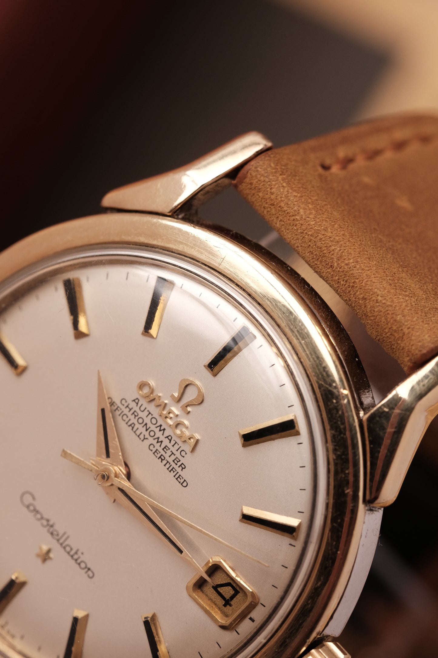 OMEGA CONSTELLATION DOG LEG GOLD AUTOMATIC CHRONOMETER REF. 168.005