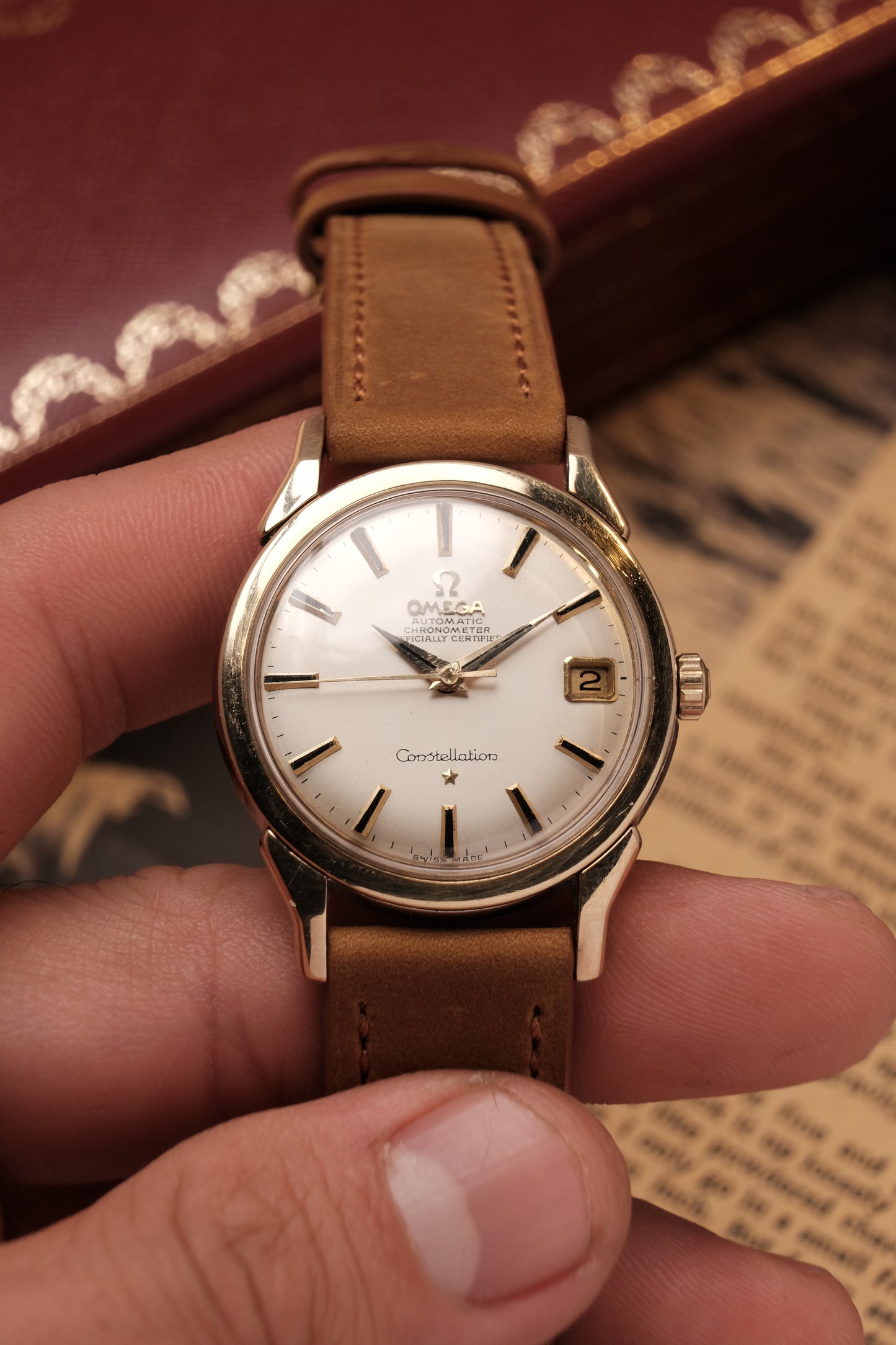 OMEGA CONSTELLATION DOG LEG GOLD AUTOMATIC CHRONOMETER REF. 168.005