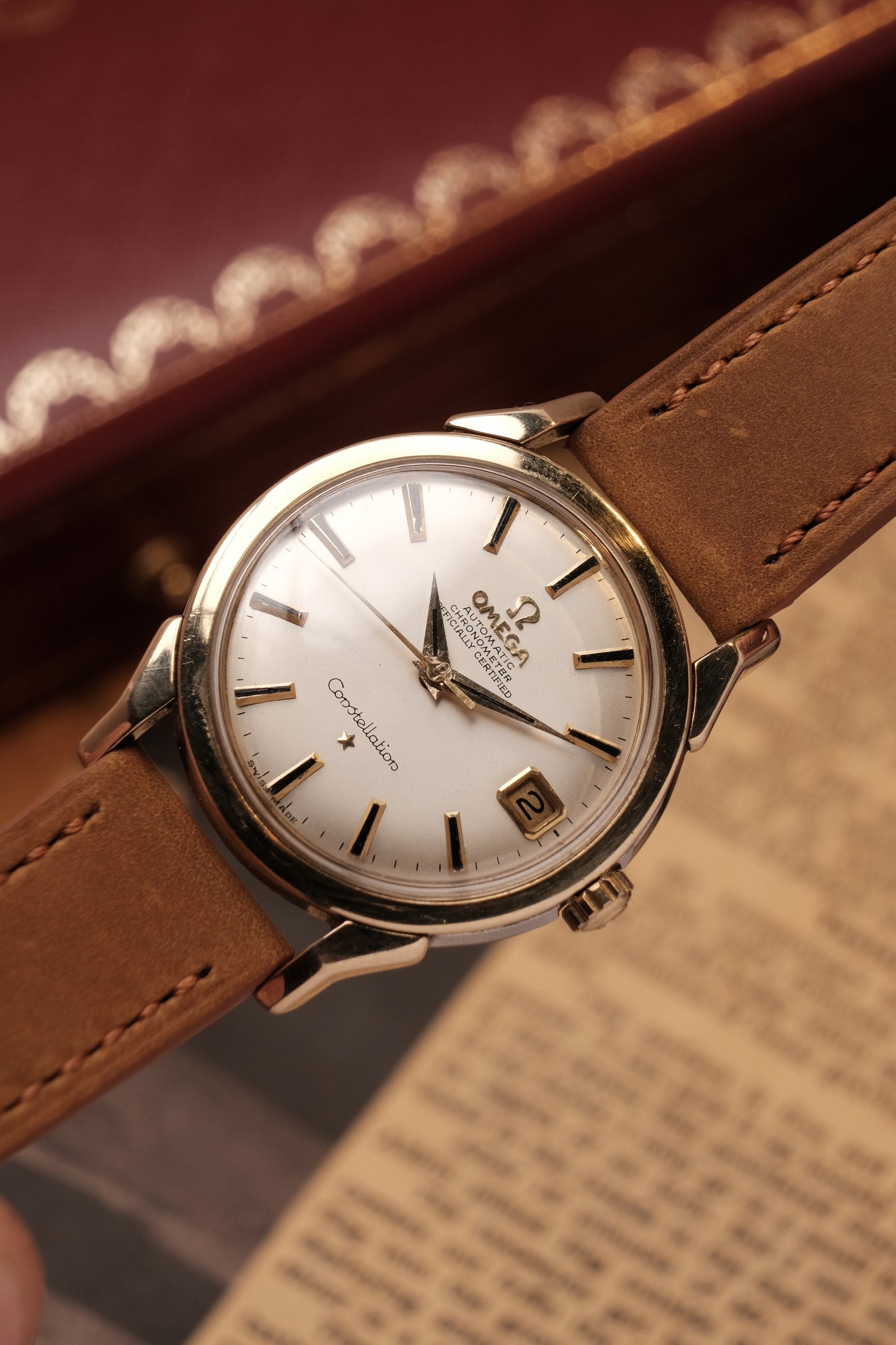 OMEGA CONSTELLATION DOG LEG GOLD AUTOMATIC CHRONOMETER REF. 168.005