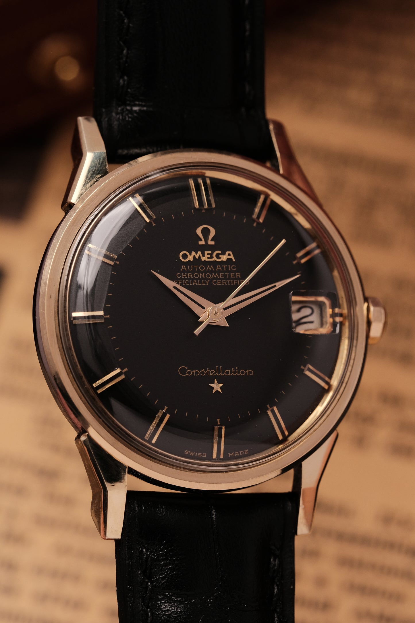 1961 OMEGA CONSTELLATION PIE PAN DOG LEG BLACK DIAL YELLOW GOLD AUTOMATIC CHRONOMETER REF. 168.005