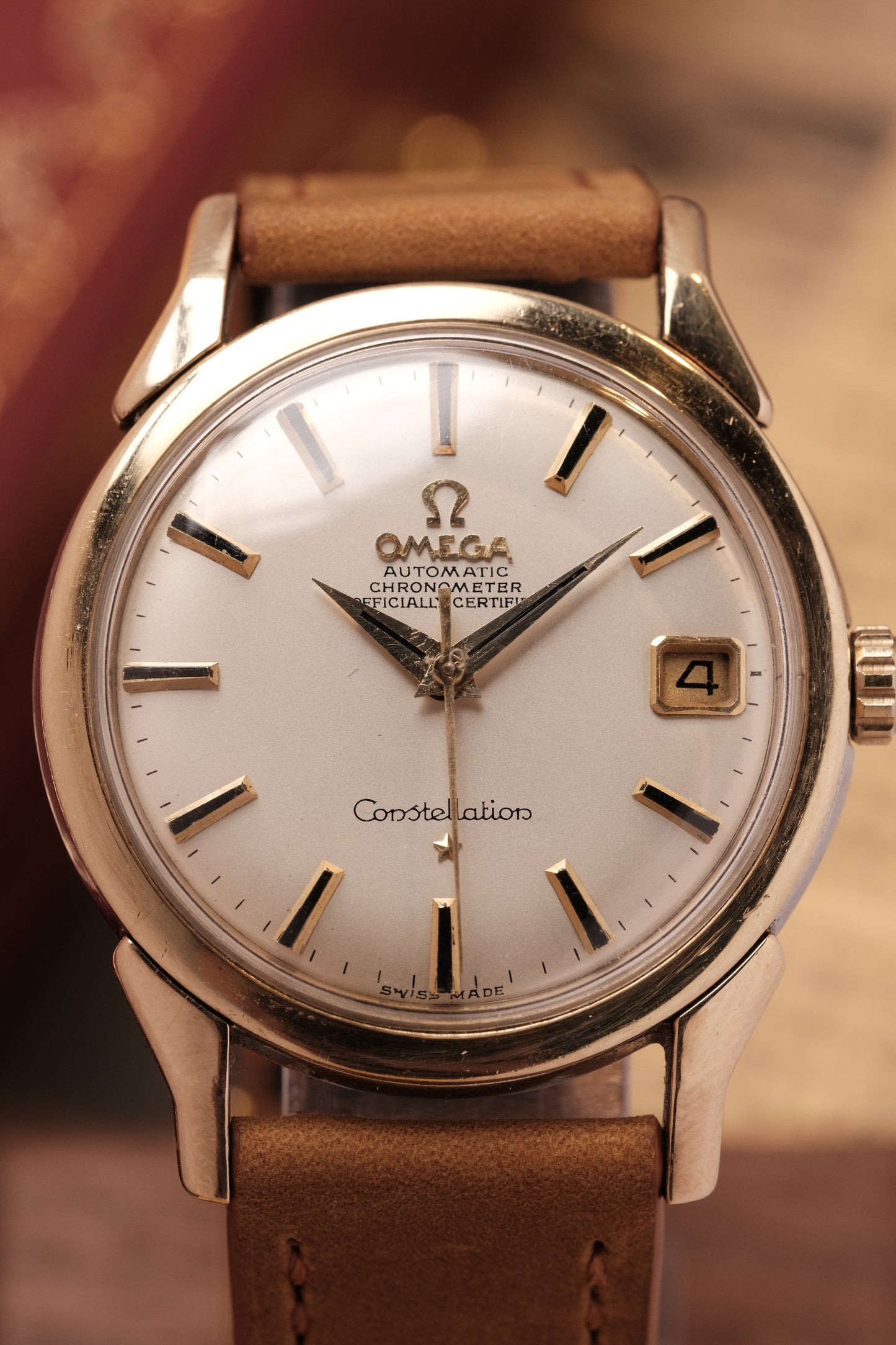 OMEGA CONSTELLATION DOG LEG GOLD AUTOMATIC CHRONOMETER REF. 168.005